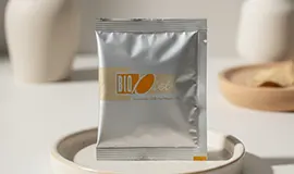 Close-up shot of the silver Bio-Diet sachet, formulated with key ingredients Oil Palm Fiber, Guar Gum, and Fruit & Vegetable Husk for effective cleansing.